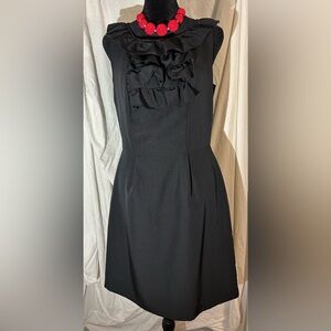 Banana Republic. Size 6. NWOT black dress with ruffles